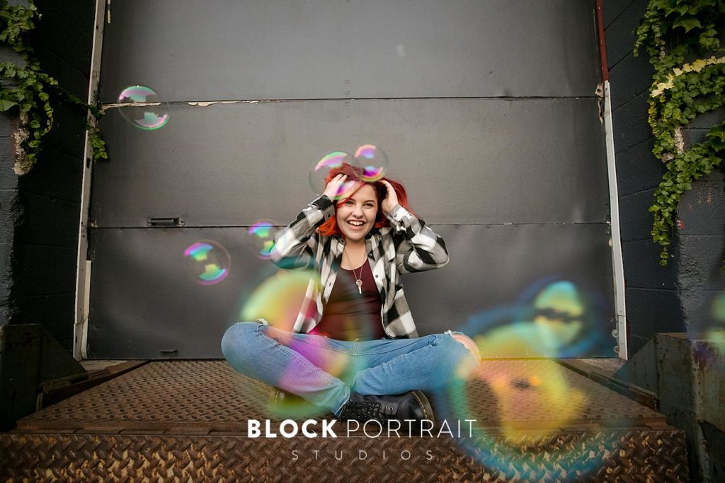 Senior portrait with bubbles by Minneapolis photographer Block Portrait Studios
