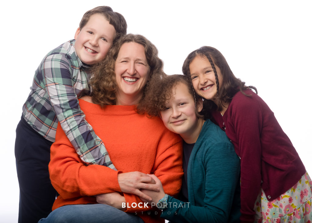 Picture of mom and her kids shot in Saint Paul studio by Block Portrait Studios