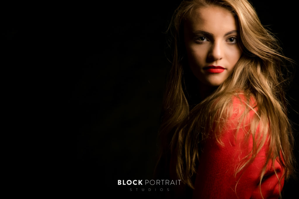 Picture of serious senior girl in Saint Paul studio by Block Portrait Studios