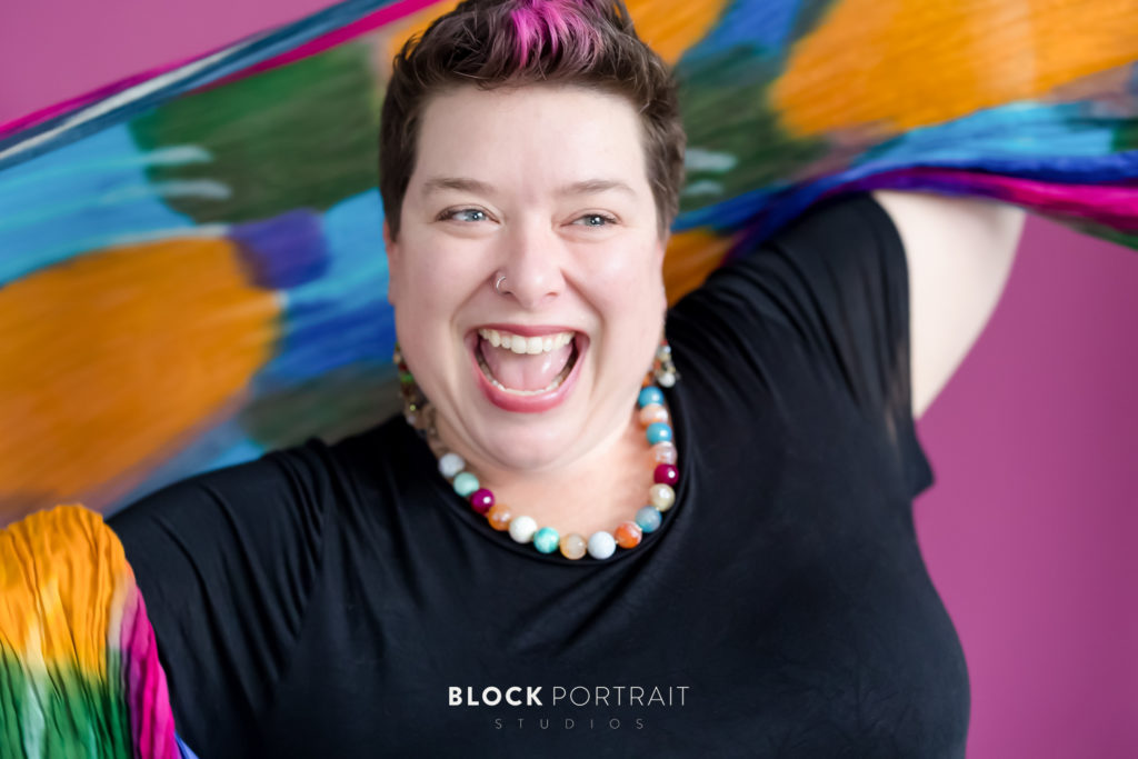 Vibrant headshot on colorful background in Minnesota studio by Block Portrait Studios