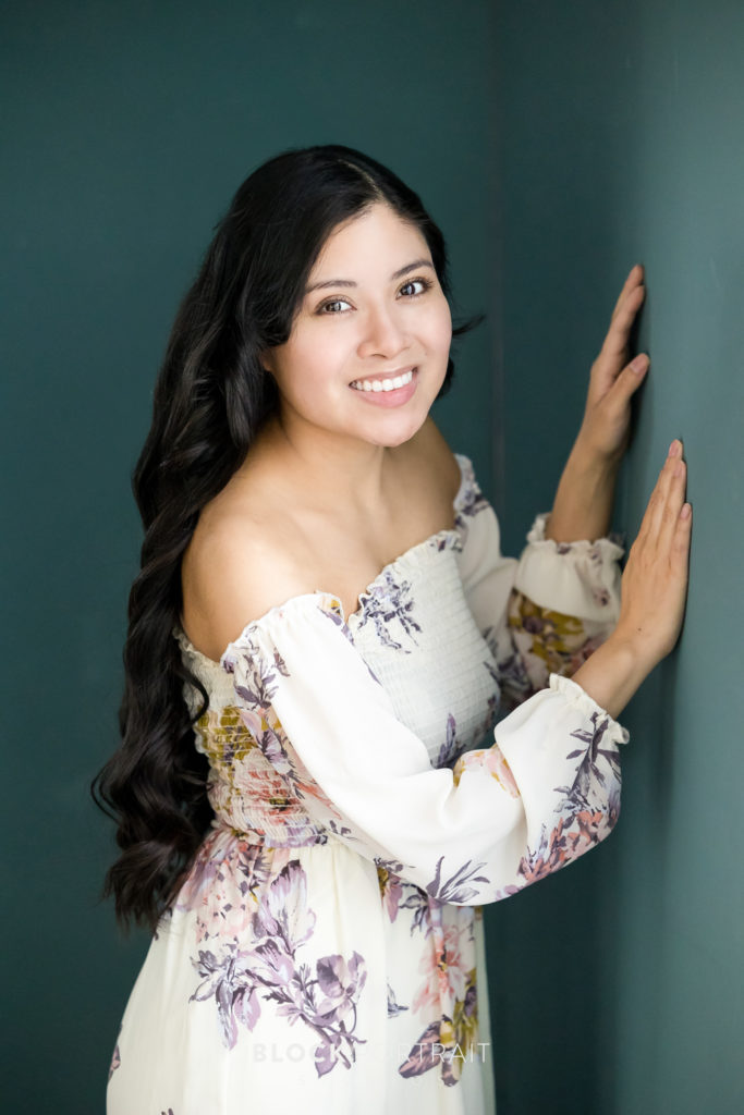 Modeling headshot of latina woman in a floral dress, by MSP headshot photographer