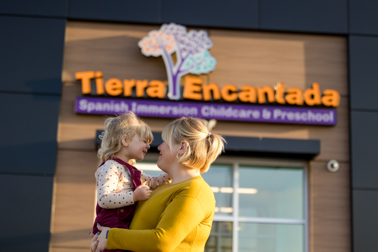 Mother and child outside Twin cities preschool by Block Portrait Studios