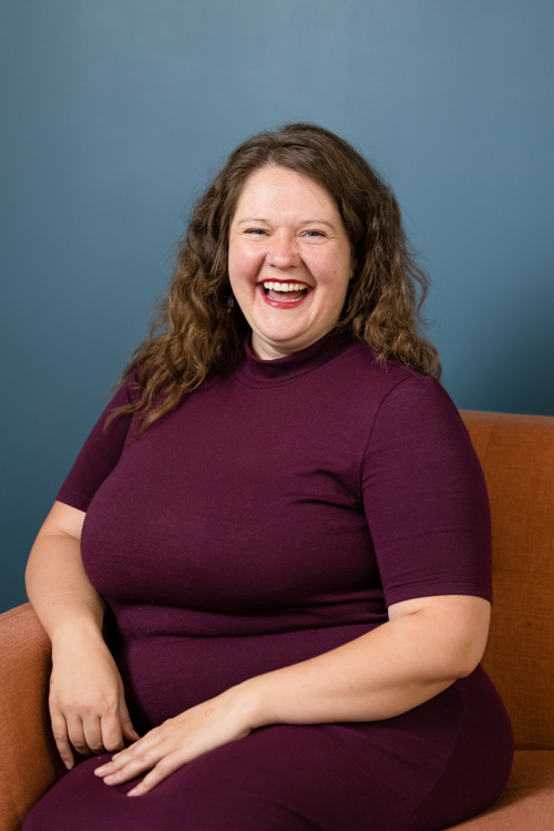 Twin Cities woman smiling for her portrait by Block Portrait Studios