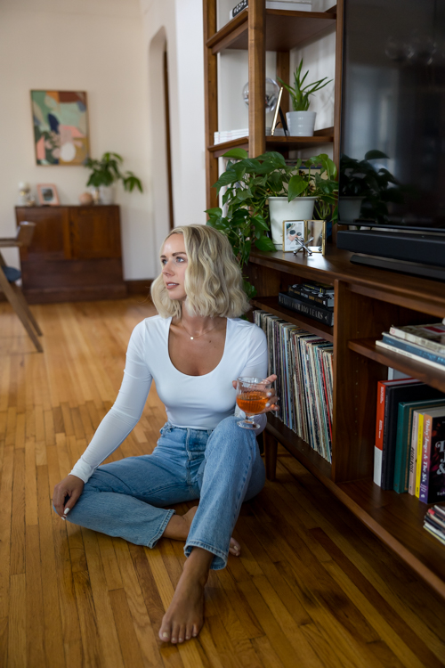 St. Paul brand designer posing in her home by Twin Cities photographer Block Portrait Studios